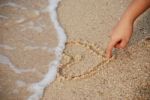 Heart Drawing On The Sand Stock Photo