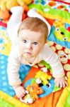 Infant Boy On Playmat Stock Photo