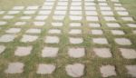 Concrete Floor With Green Grass Stock Photo