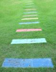 Wooden Piece Color Path Walk On Green Field Stock Photo