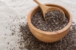 Chia Seeds In Wooden Bowl Background Stock Photo