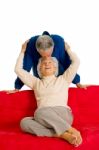 Loving Couple Sitting In Sofa Stock Photo