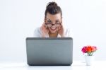 Woman With Laptop Working At Home Stock Photo