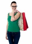 Smiling Lady Carrying Shopping Bags Stock Photo