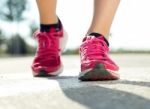 Runner Feet Running On Road Closeup On Shoe Stock Photo