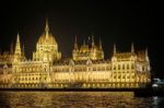 Hungarian Parliament Building Illumintaed At Night In Budapest Stock Photo