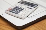 Calculator And Laptop Stock Photo