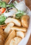 Gourmet Fish And Chips With Salad Stock Photo