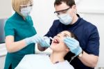 Young Woman Undergoing A Dental Check Stock Photo