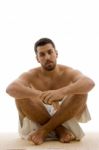 Man In Sitting Pose Stock Photo