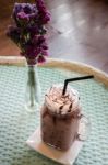 Iced Chocolate On Glass Table Top Stock Photo