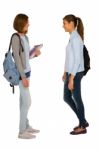 Girl Students Holding Books And Bag Stock Photo