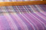 Detail Of Fabric In Comb Loom With Ultraviolet And Lilac Colors Stock Photo