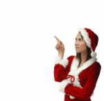 Santa Girl Pointing Up Stock Photo