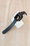 Apple Watch In Stand Displaying Mediocre Daily Activities Stock Photo