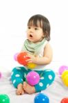 Baby Girl Is Playing Ball On White Background Stock Photo