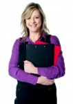 Woman Holding Documents Tightly Stock Photo