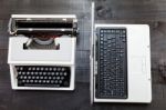 Typewriter And Computer Laptop On Wooden Background Retro Stock Photo