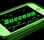 Success On Smartphone Showing Progression Stock Photo