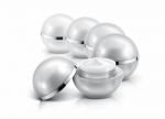 Several Silver Sphere Cosmetic Jar On White Background Stock Photo