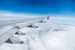 View Of Beautiful Sky With Aircraft Wing From Aircraft Window Stock Photo