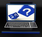 Question Mark On Laptop Showing Confusion Stock Photo