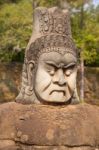 Statue Of Ancient Khmer Warrior Head At Angkor Wat Stock Photo