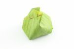 Dessert Banana Leaf Package With Bamboo Stick Stock Photo