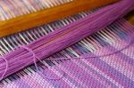 Detail Of Fabric In Comb Loom With Ultraviolet And Lilac Colors Stock Photo