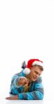 Laying Man With Christmas Hat Stock Photo