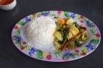 Seafood With Yellow Curry Sauce With Rice , Sauteed Seafood Contains Shrimp Squid, Stock Photo