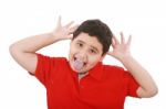 Boy With Funny Facial Expression Stock Photo