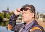 Portrait Of Elderly Man With Glasses Stock Photo