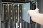 Man Fix Server Network In Data Center Room Stock Photo