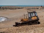 Bulldozer On Hastings Beach Stock Photo