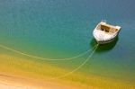 Boat At Lake Shore Stock Photo