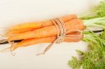 Baby Carrots Bunch Tied With Rope Stock Photo