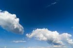 White Clouds In Blue Sky Stock Photo