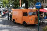 Orange Van In The Market Square In Bad Ischl Stock Photo