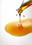 Sweet Honey From Bottle With Bees Stock Photo