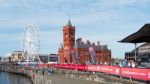 Cardiff/uk - August 27 : Ferris Wheel And Pierhead Building In C Stock Photo