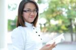 Woman Carry Book Stock Photo