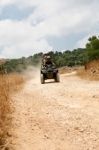 Man With Quad Bike Riding Stock Photo