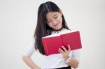 Portrait Of Thai Teen Beautiful Girl Reading Book Stock Photo