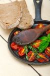 Baked Cherry Tomatoes With Basil And Thyme Stock Photo