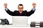 Excited Businessman Shouting And Rejoicing Stock Photo