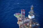 Helicopter Embark Passenger On The Offshore Oil Rig Stock Photo