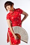 Chinese Model In Traditional Cheongsam Dress Stock Photo