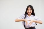 Portrait Of Thai High School Student Uniform Beautiful Girl Give Heart Stock Photo