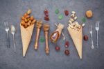 Concept For Homemade Various Nuts Ice Cream. Mixed Nuts In Waffl Stock Photo